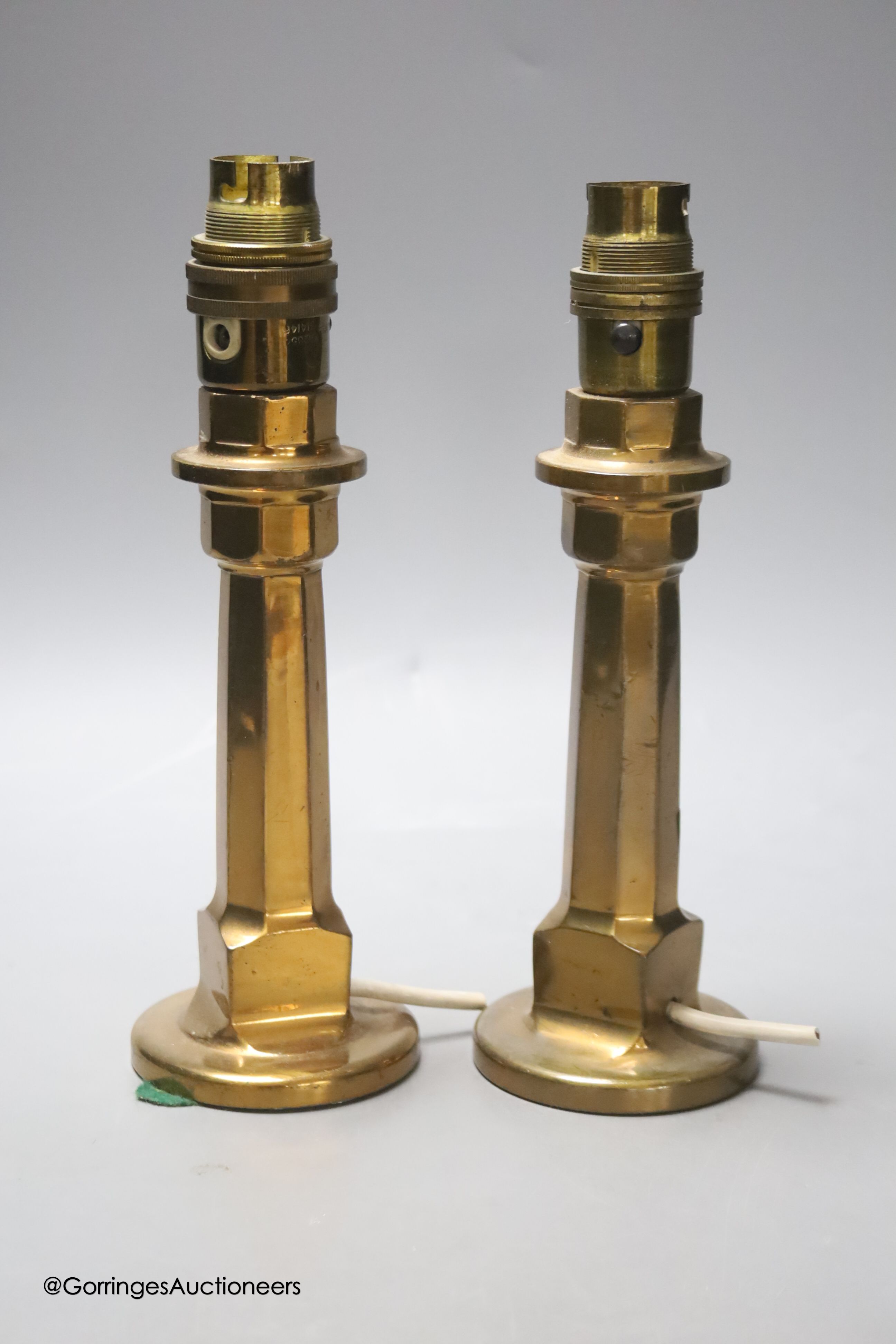 A small pair of converted hose lamps, height 23cm